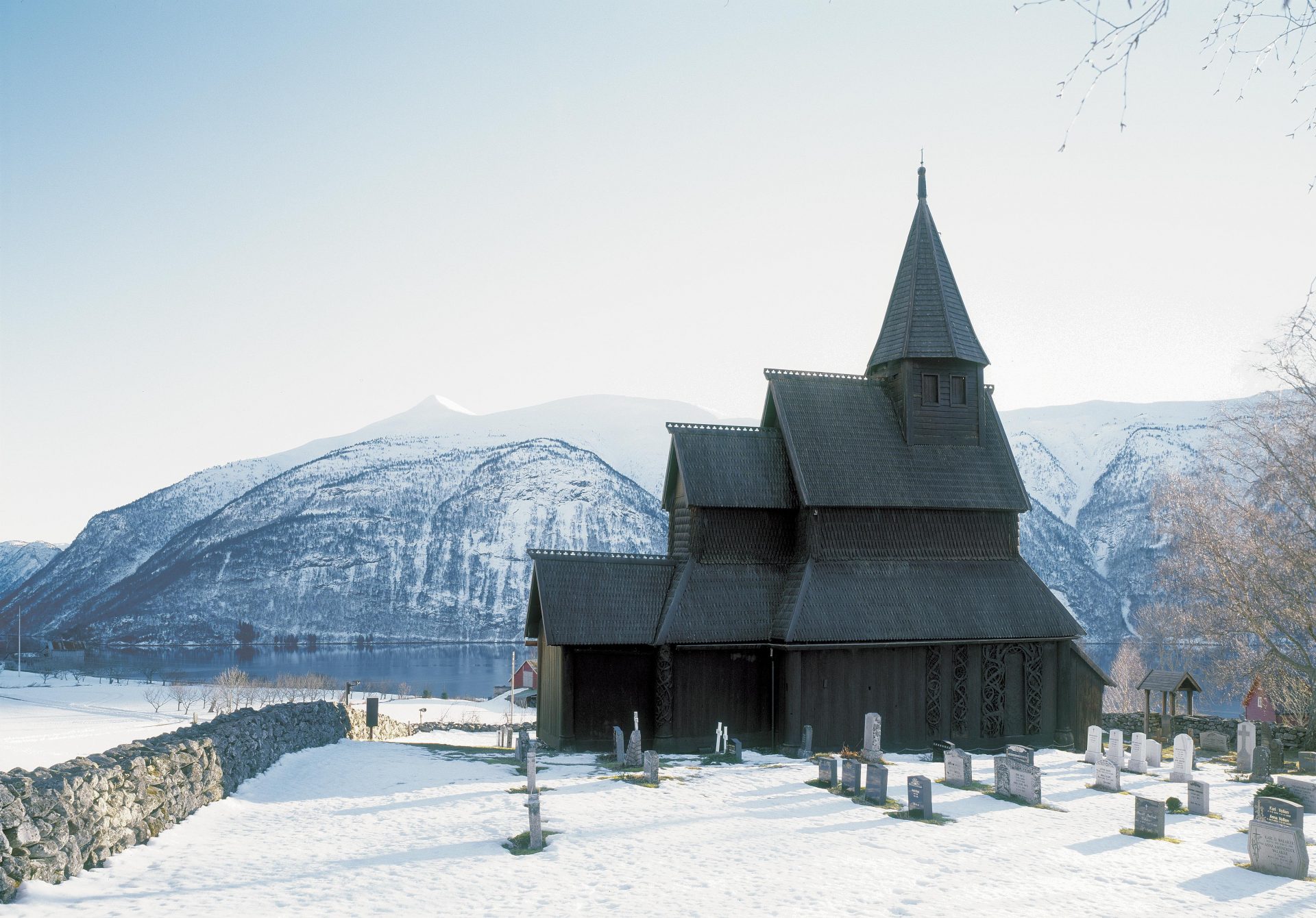 Urnes Stave Church in a beautiful winter landscape by Lustrafjorden in Sogn og Fjordane. Photo: Jiri Havran, the Norwegian Directorate for Cultural Heritage