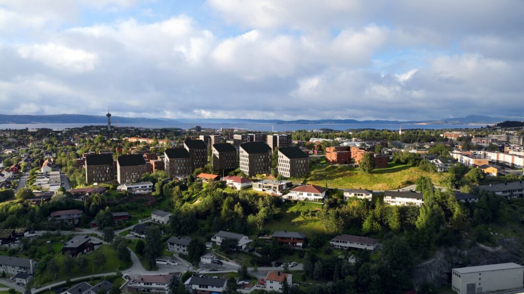 Illustrasjon av nye Moholt studentby. Riksantikvaren har innsigelse til de høye bygningene ved siden av en gravhaug.